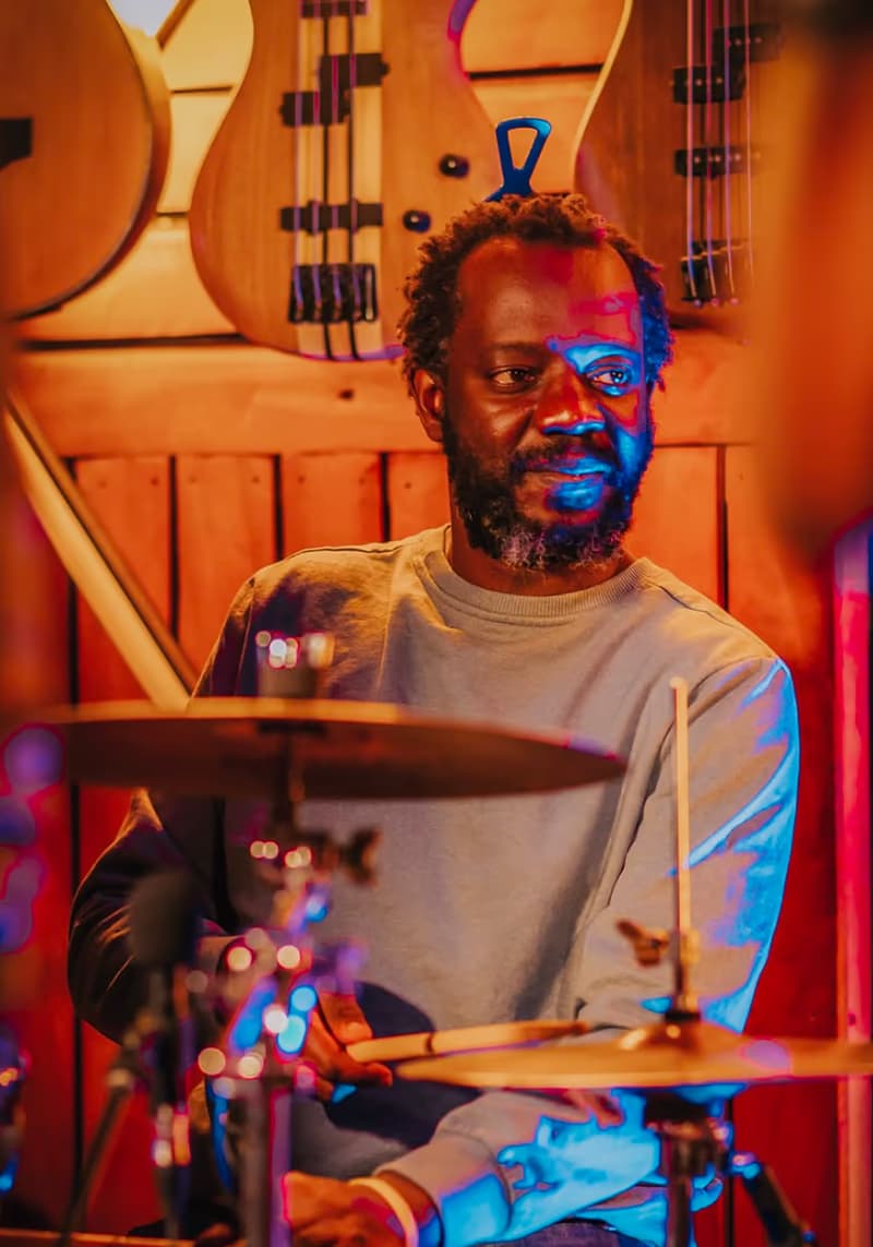 A drummer performing live at Geco Cafe